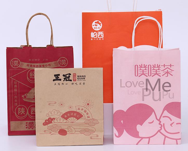 Bán buôn logo tùy chỉnh có thể tái chế túi giấy kraft mua sắm màu nâu với tay cầm phẳng xoắn